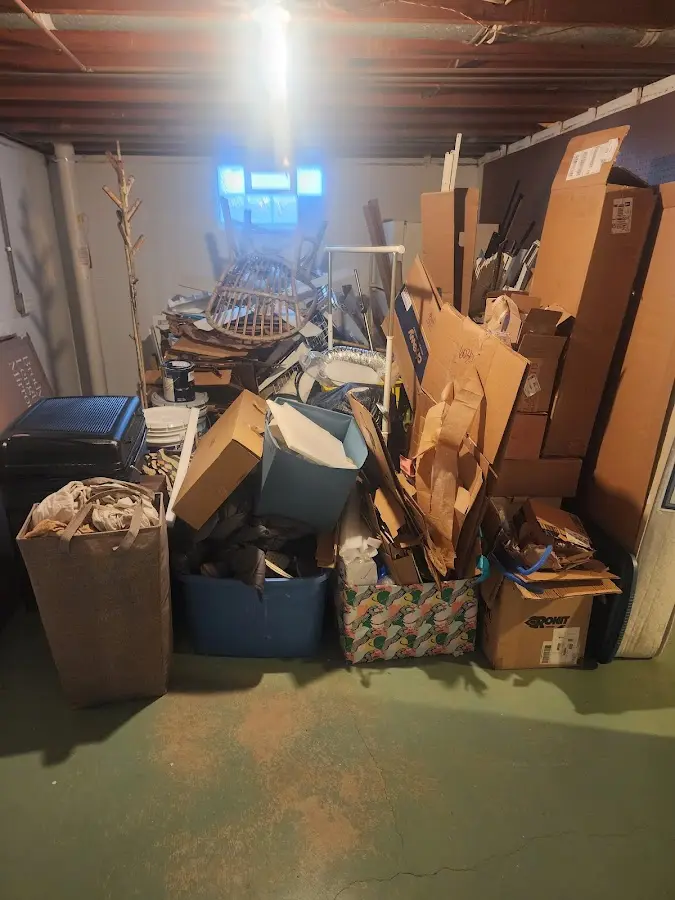 Roll-off dumpster container at job site for 2 Yard Dumpster Rental in Redford